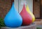 The sculpture of three drops - blue, red and yellow stands on the street