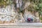 Sculptured art on the rock in Aguas Caliente, Peru