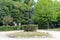 Sculptured lamp post in the park of Curia Palace, historic hotel with manicured gardens, Anadia, Portugal