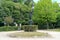 Sculptured lamp post in the park of Curia Palace, historic hotel with manicured gardens, Anadia, Portugal