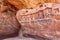 Sculptured wall with Hindu gods in natural cave of Badami town, India. Temple carvings made in 6th century