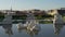 Sculptures in fountain of Belvedere palace with Vienna cityscape