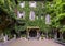 Sculptures, plants and Ivy on the outside of the Atellani House, Museo Vigna di Leonardo, Milan.