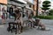 Sculptures of resting children with pets on the street of the coastal city of Marmaris. Turkey