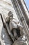 Sculptures of saints and martyrs decorating the Cathedral of Milan Duomo di Milano are shot close-up.