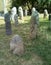 Scythian stone women on the lawn near the city museum. Ancient gray stone sculptures.