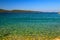 Sea background, Sibenik, Croatia. Transparent, clear water on an ecologically clean, picturesque summer beach. Beautiful