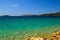 Sea background, Sibenik, Croatia. Transparent, clear water on an ecologically clean, picturesque summer beach. Croatian