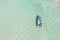 Sea background texture. Aerial drone view of inflatable boat in Elafonisi island water Greece. Space