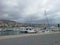 Sea bay with yachts and boats at cloudy day in San Remo, Italy, view from city Sanremo, Italian Riviera