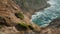 Sea beach cliff nature aerial view. Rocky shore island foamy ocean landscape