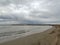 Sea. Beach. Storm. Stormy sky with the sky covered with gray clouds next to the shore of the Mediterranean Sea