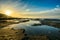 The sea and the beautiful expanse of blue sky with clouds and sunlight at sunset. Russia Azov sea