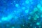 Sea blue bokeh abstract background caused by spray water