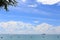 The sea with blue sky and cloud and mountains, as nature.