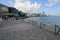 Sea, boardwalk, sky, pier, walkway, city, coast, beach, water, coastal, and, oceanic, landforms, recreation, tourism, condominium,