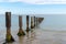 Sea breakwater breaking the waves ocean atlantic in Ile de Noirmoutier France Vendee