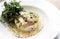 Sea bream fish fillet in creamy mustard dill and lemon sauce restaurant meal on plate