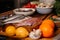 Sea bream and shells on the table next to vegetables and fruit. Ingredients for making a delicious soup.