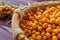 Sea buckthorn. Fresh ripe berries in wooden basket, macro photo