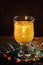 Sea buckthorn lemonade, dark wood background, selective focus