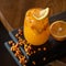 Sea buckthorn and orange smoothie vitamin drink. Glass of Healthy fresh citrus and hippophae juice or soft drink. Bright