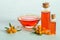Sea buckthorn and two bottles, bowl with sea buckthorn oil