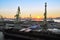 Sea cargo port, view of the water area and moorings with cranes, Sunrise early in the morning