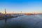 Sea cargo port, view of the water area and moorings with cranes, Sunrise early in the morning