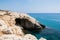 Sea caves of Cavo greco cape. Mediterranean sea landscape