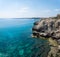 Sea caves of Cavo greco cape. Mediterranean sea landscape