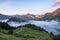 Sea clouds by a lake in the mountains in the French Alps