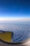 Sea of clouds seen through the window of a passenger plane