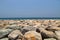 Sea coast coastline, rock breakwater  Dubai, United Arab Emirates