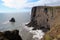 Sea coast near the Arch Dyrholaey in Iceland