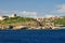 A sea coast in Sardinia, Sardegna, Italy Europe with cliffs and small town