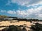 sea coast shore ocean cloud sky beach rock wave horizon sand bay water cape terrain cliff landscape nature Mauritius