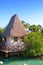 The sea coast with the traditional house in Xcaret park near Cozumel, Mexico