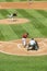 Sea Dogs Pitcher in throwing motion with infield in view. in Hadlock Field Portland, Maine