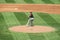 Sea Dogs Pitcher in throwing motion with infield in view. in Hadlock Field Portland, Maine