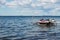 Sea-doo jet skis and people having fun on a boat on Oneida Lake, NY State.