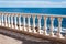 Sea and fence with white balusters