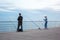 Sea fishing from the pier. Evening, Odessa City, Ukraine, June 2019