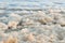 Sea foam on a beach