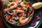 Sea food salad with shrimps, avocado, cherry tomatoes, red hot chilly pepper, red onion, arugula, beet leaves,