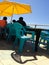 Sea front cafe beach table chair umbrella