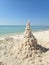 Sea Green Wave Breaking on Panama City Beach With Sandcastle