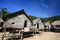 Sea Gypsy, Morgan, wooden houses against blue sky