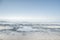 Sea horizon and white sandy beach. Vada, Tuscany, Italy