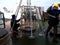 The Sea of Japan / Russia - November 30 2013: Science expedition team prepearing the multi core sampler to launch for deepwater sa
